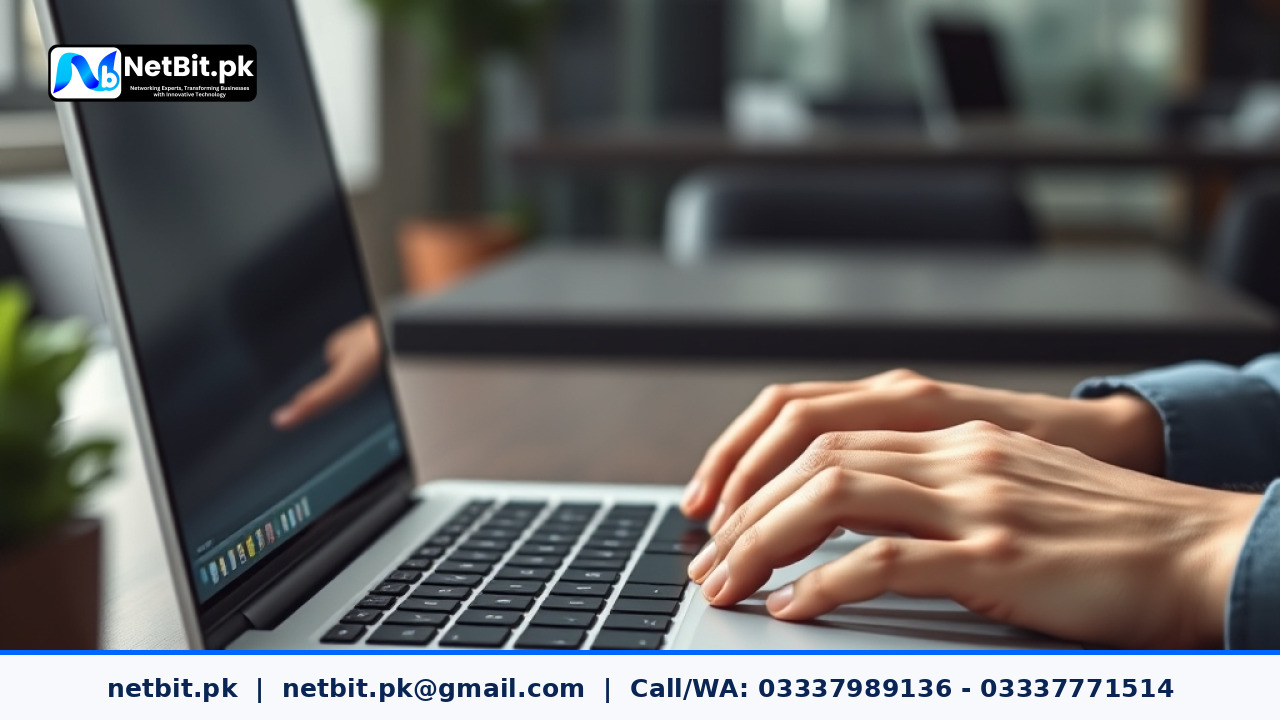 Developer hands typing on a laptop keyboard writing secure code in a modern office